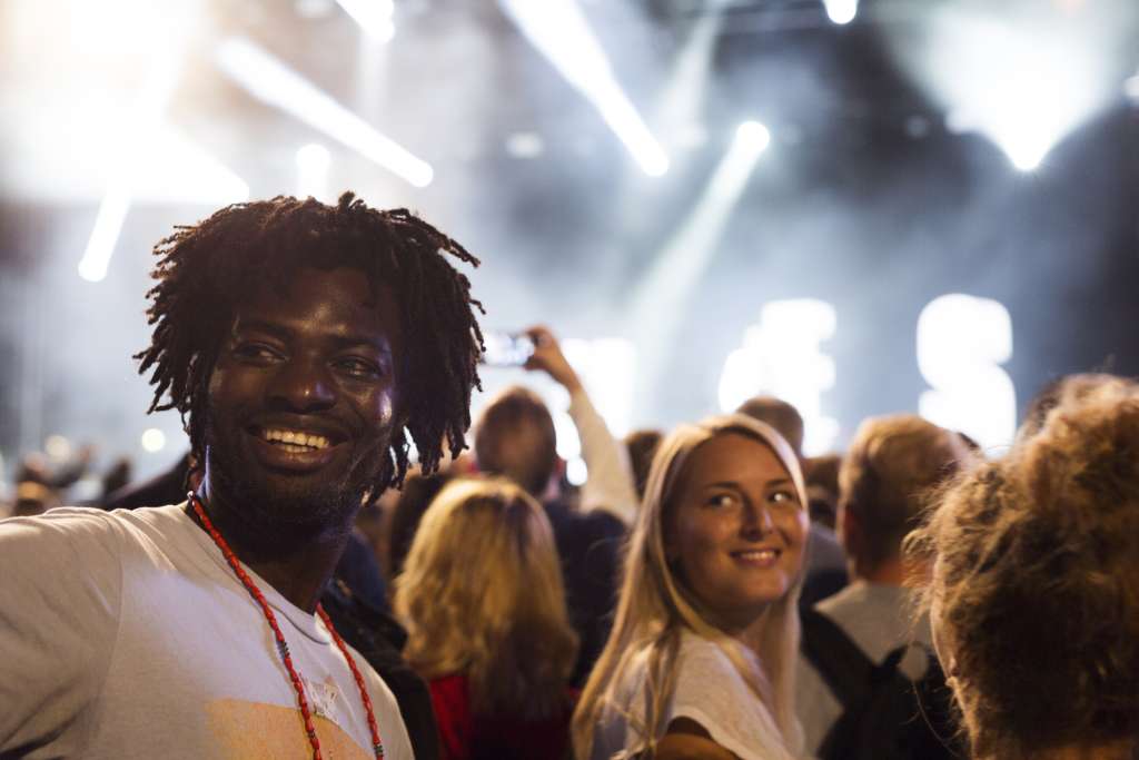 Friends having fun at music concert